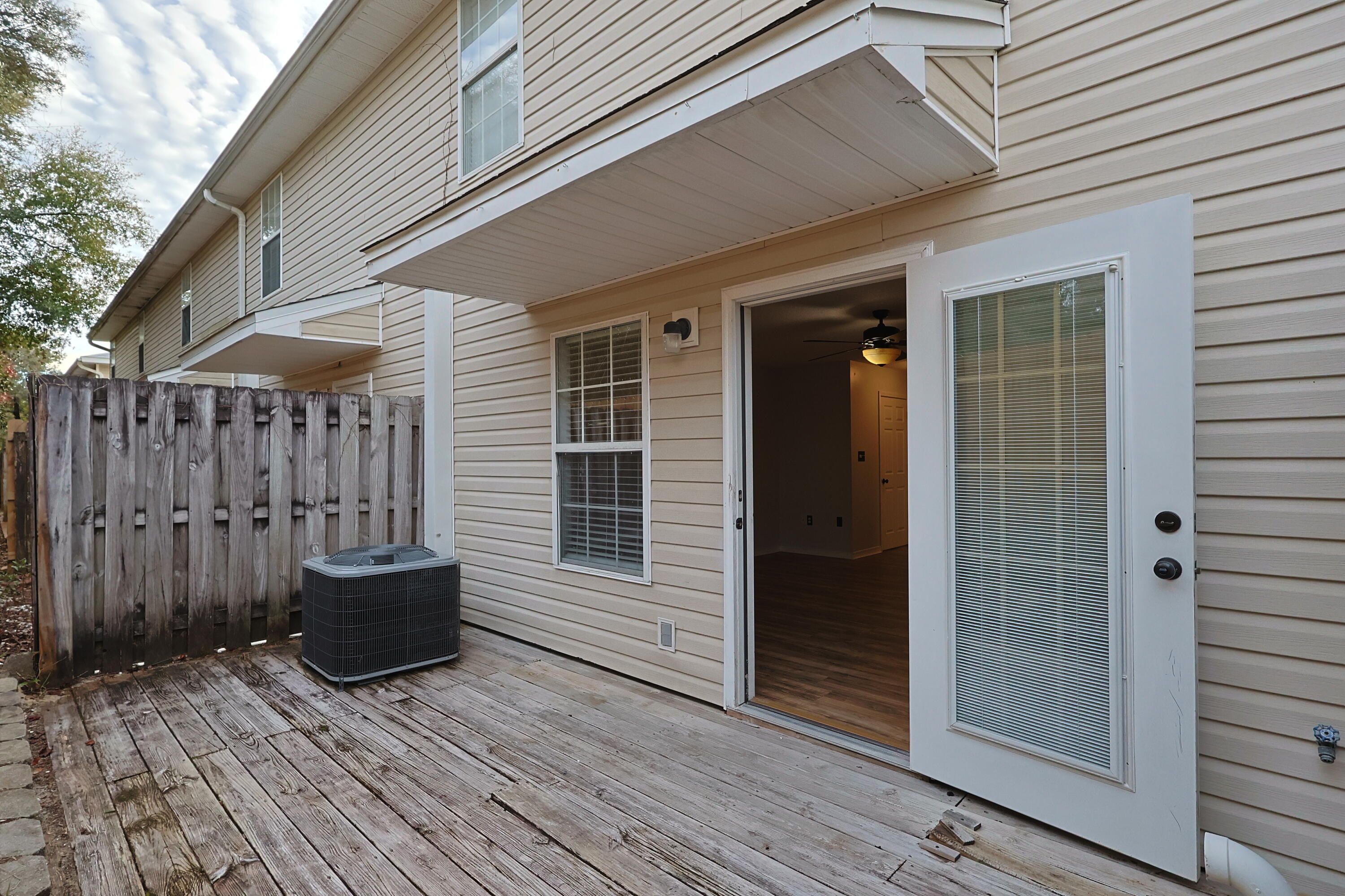 487 Keystone Road Mary Esther, FL 32569 - Photo 8 of 35 a view of house with wooden floor and outdoor space