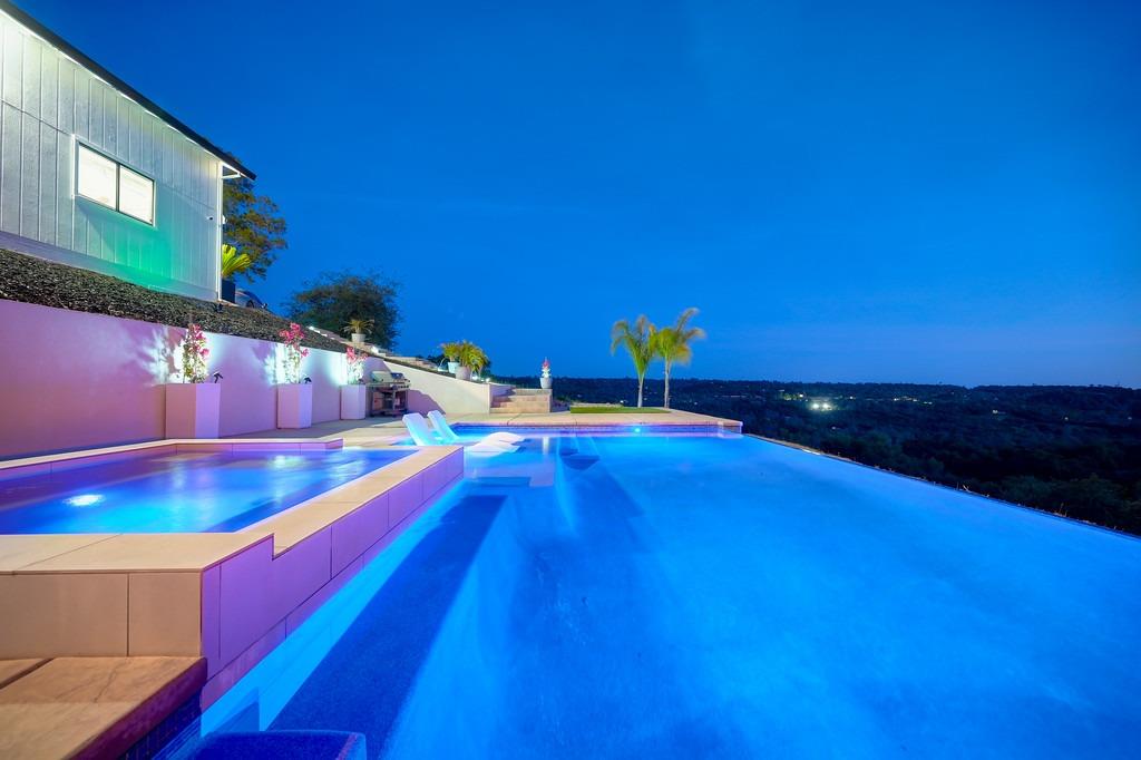 Negative edge salt water pool allows you to enjoy the incredible view, day or night.