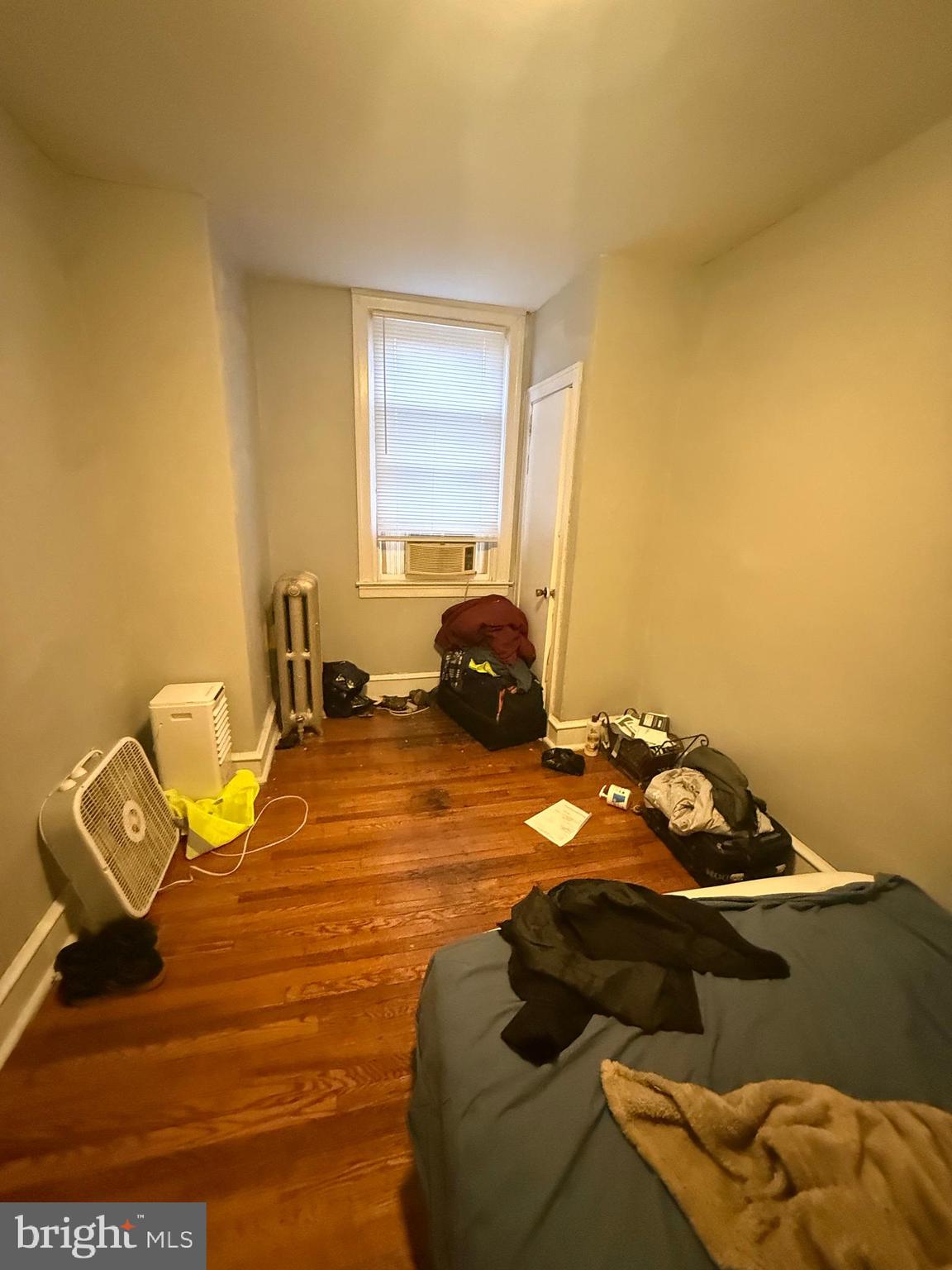 1861 South 65th Street Philadelphia, PA 19142 - Photo 14 of 31 a bedroom with a bed and window
