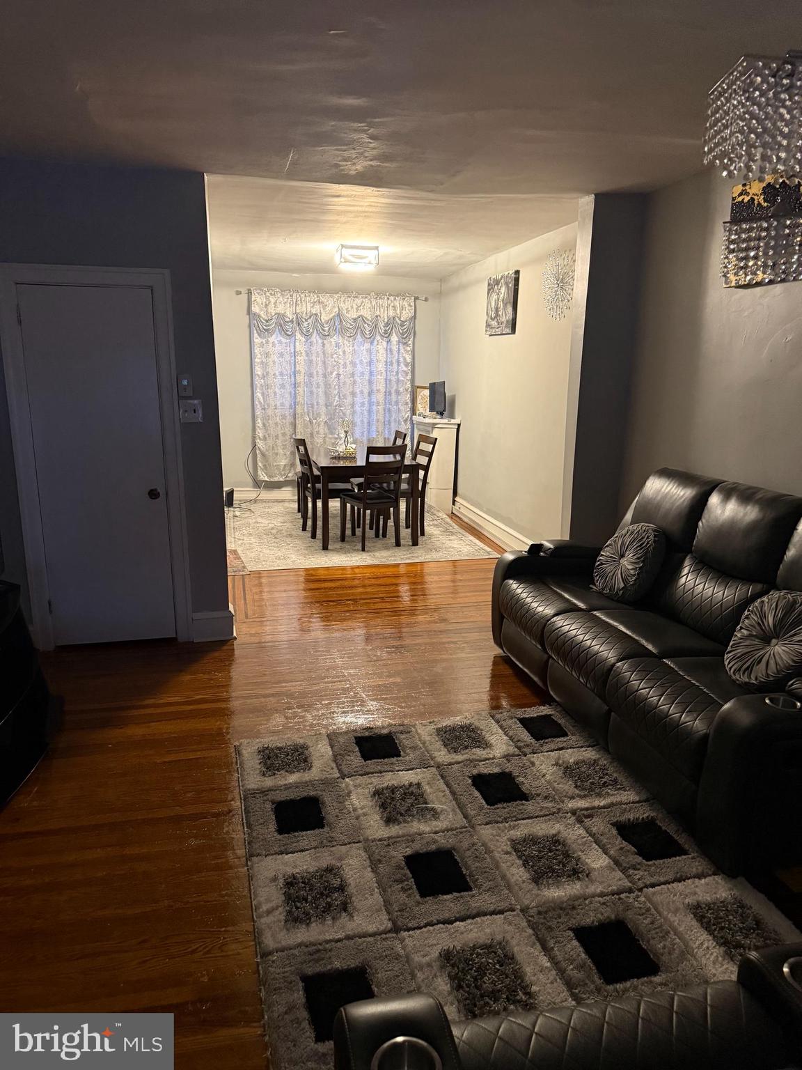1861 South 65th Street Philadelphia, PA 19142 - Photo 3 of 31 a living room with furniture and a flat screen tv