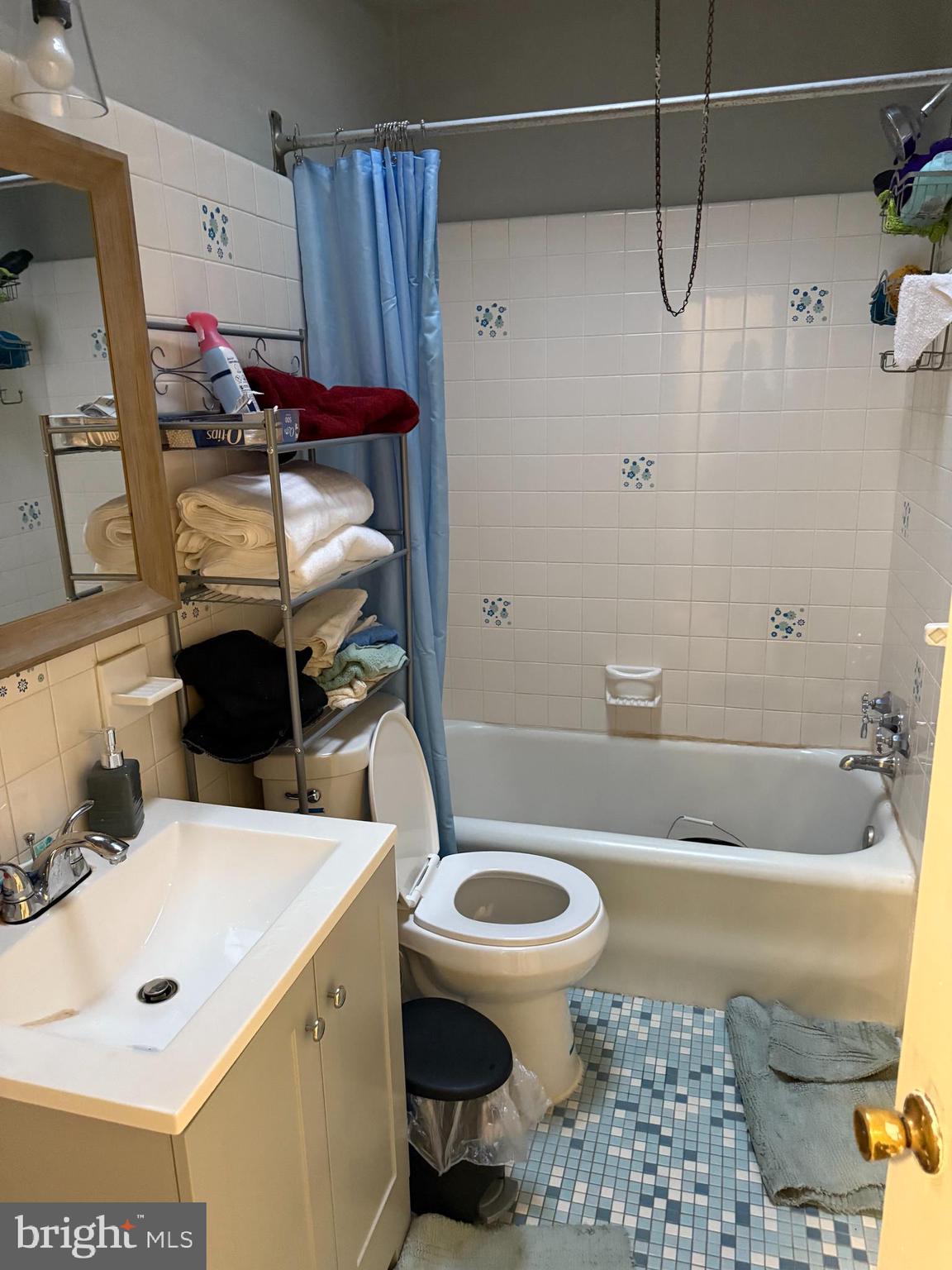1861 South 65th Street Philadelphia, PA 19142 - Photo 10 of 31 a bathroom with a sink toilet and shower