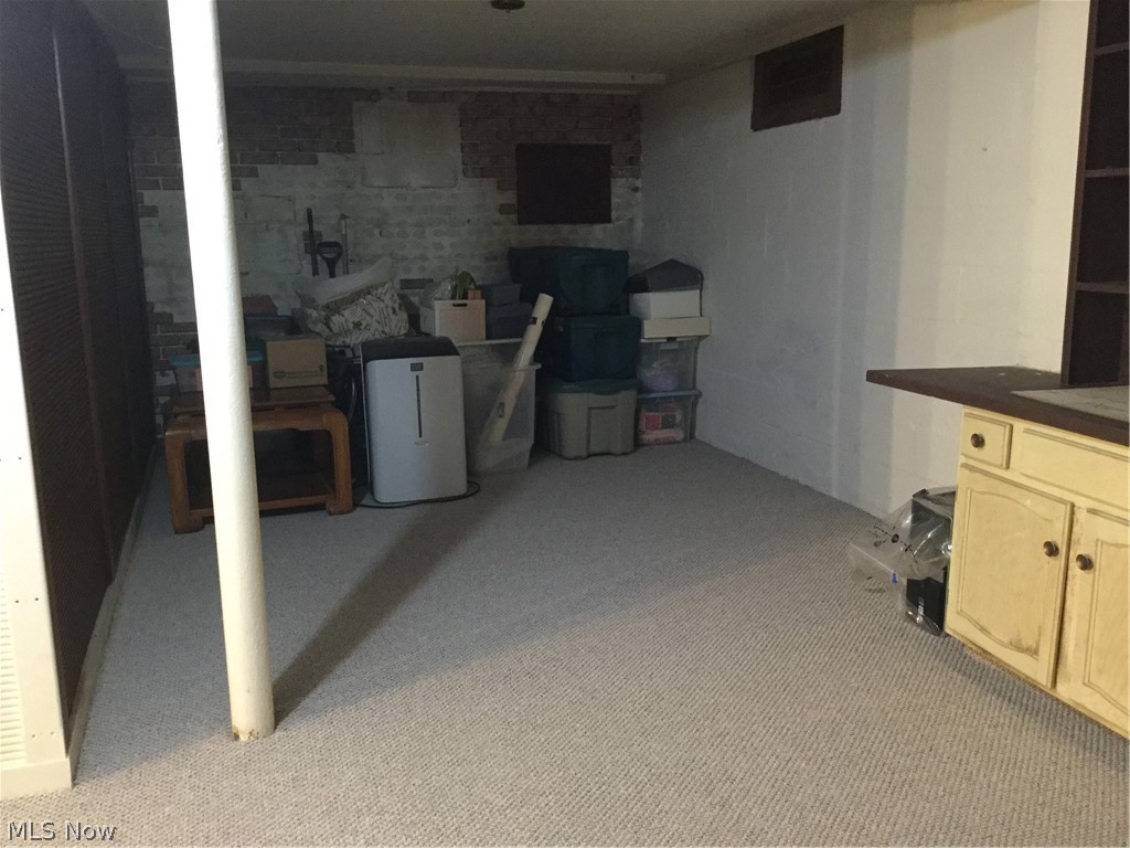 2980 Pontius Road Uniontown, OH 44685 - Photo 25 of 32 A 3rd view of the basement with new carpet installed on 12/14/18