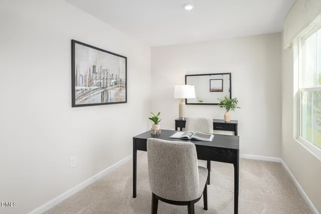 a dining room with table and chair