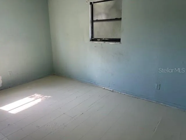 an empty room with a window