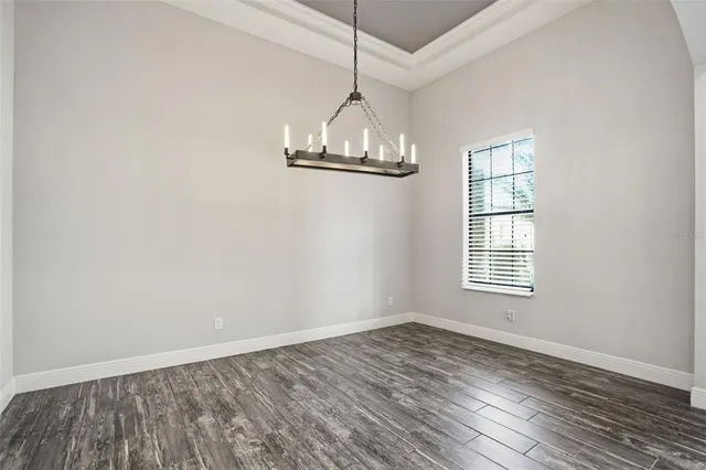 an aerial view of house with yard swimming pool and outdoor seating