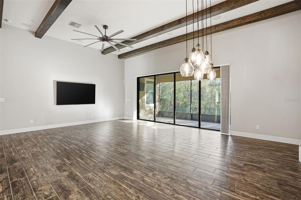 31999 Watoga Loop Wesley Chapel, FL 33543 - Photo 7 of 67 a view of an entryway with wooden floor
