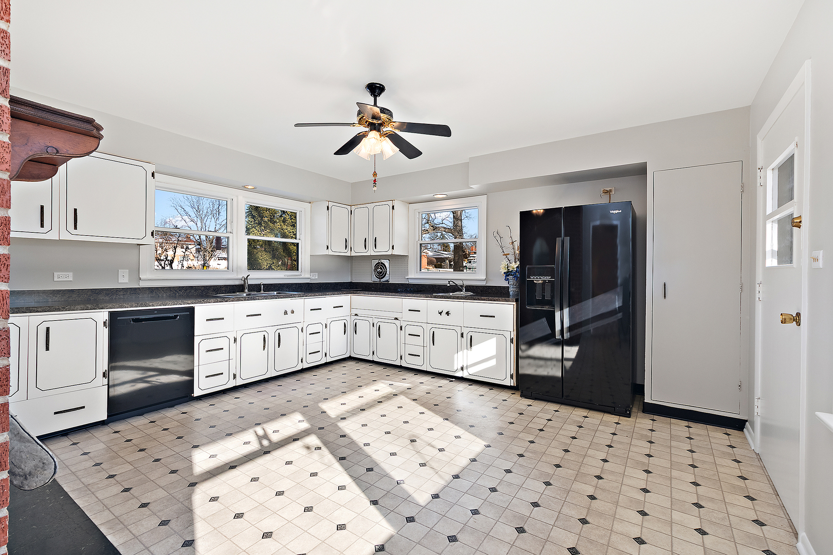 13 Riegel Oaks Lane Homewood, IL 60430 - Photo 16 of 26 a kitchen with stainless steel appliances kitchen island granite countertop a refrigerator a sink a stove and white cabinets