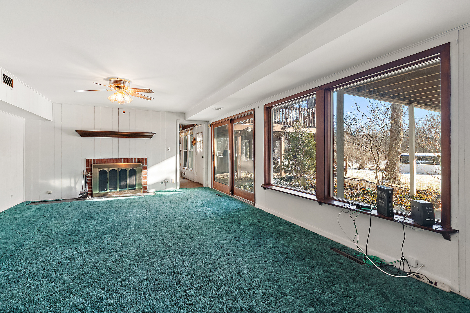 13 Riegel Oaks Lane Homewood, IL 60430 - Photo 23 of 26 a living room with a large window and a fireplace