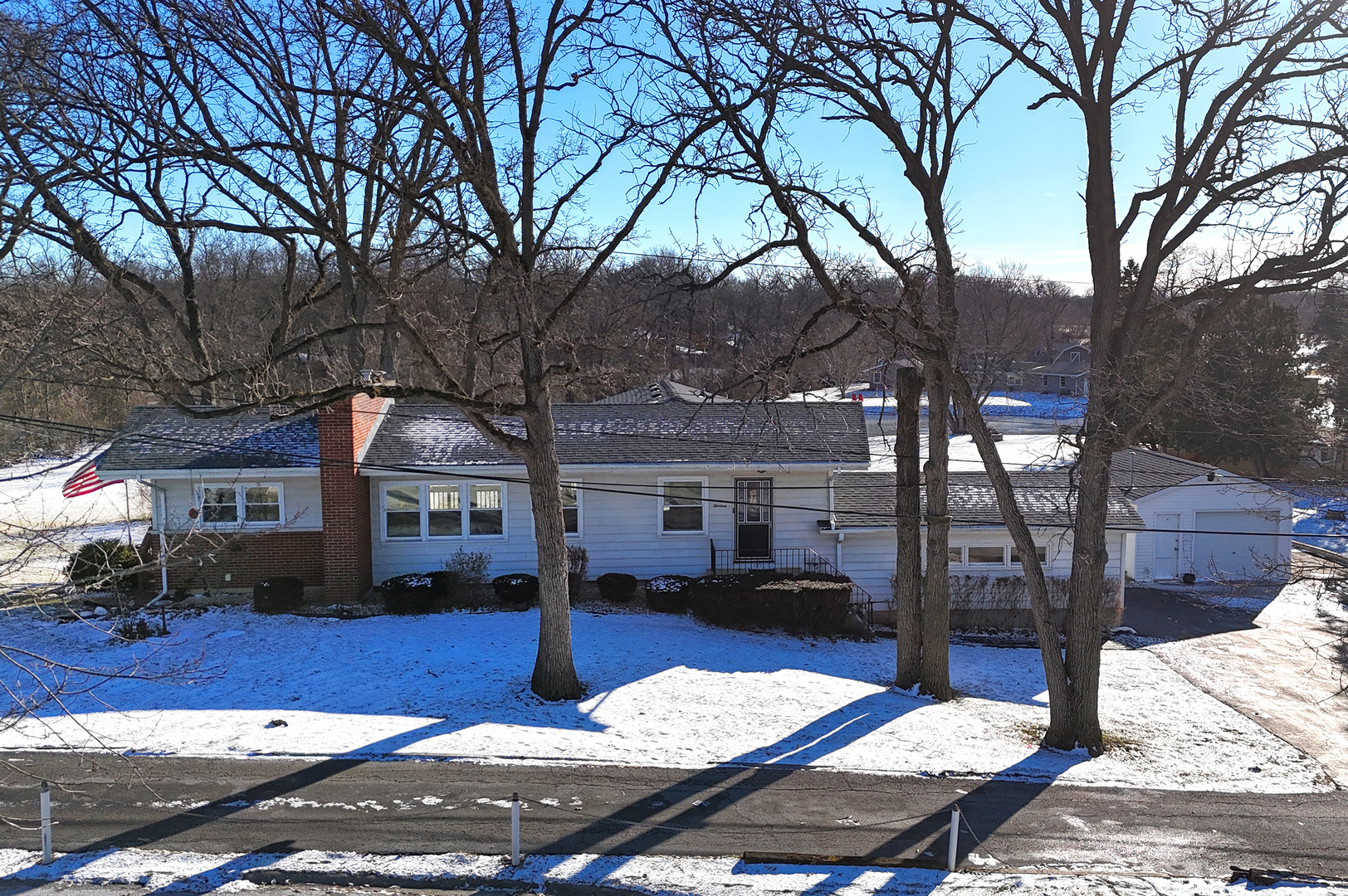 13 Riegel Oaks Lane Homewood, IL 60430 - Photo 3 of 26 a view of a street with a tree