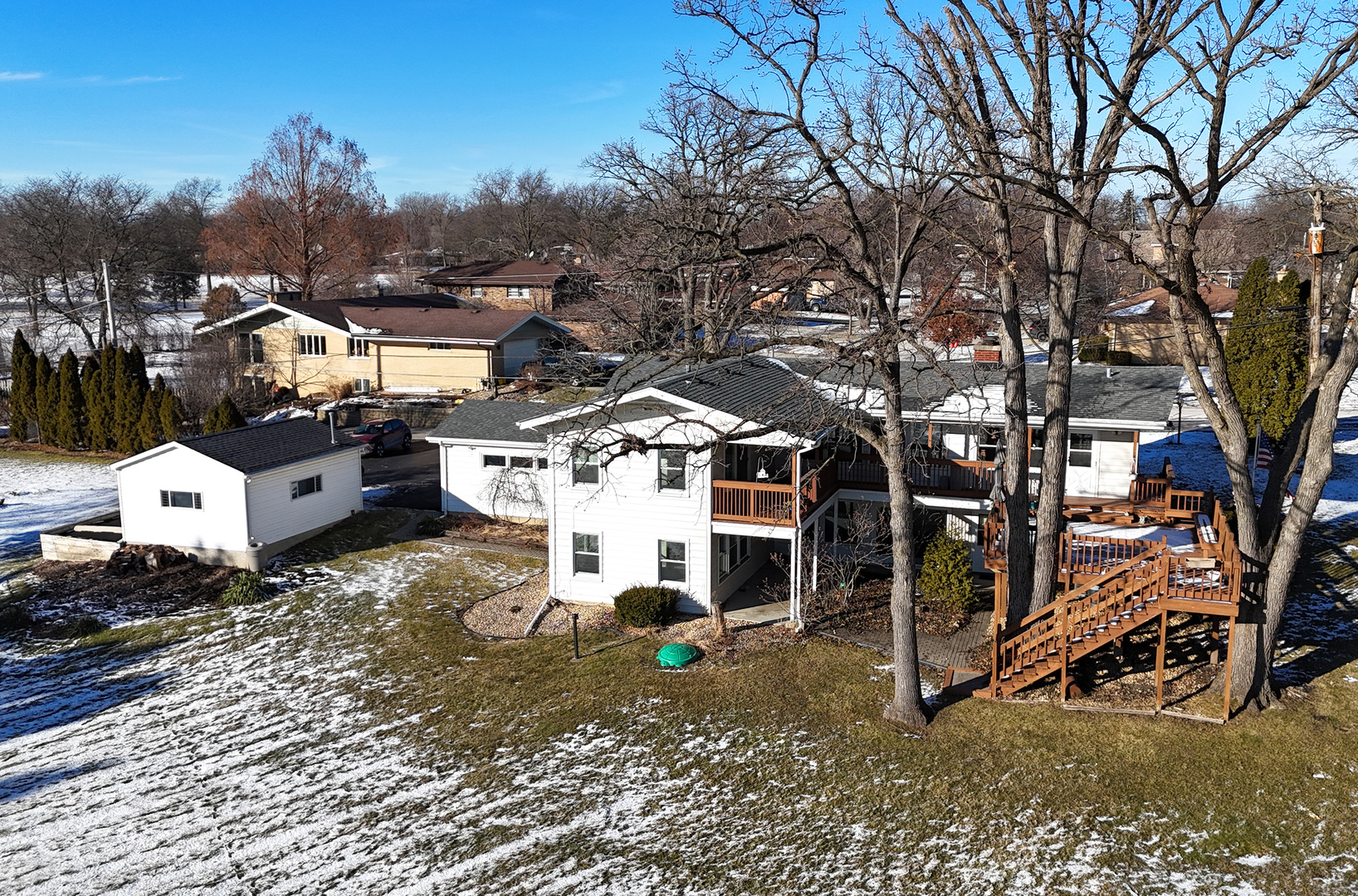 13 Riegel Oaks Lane Homewood, IL 60430 - Photo 9 of 26 a view of a white house with a yard and sitting area