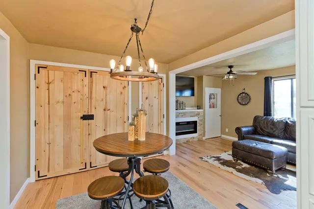 a view of a livingroom with furniture and window