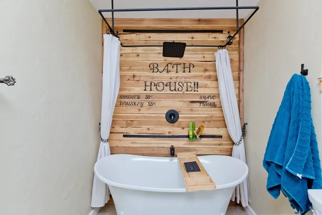 a view of entryway with a table and chairs