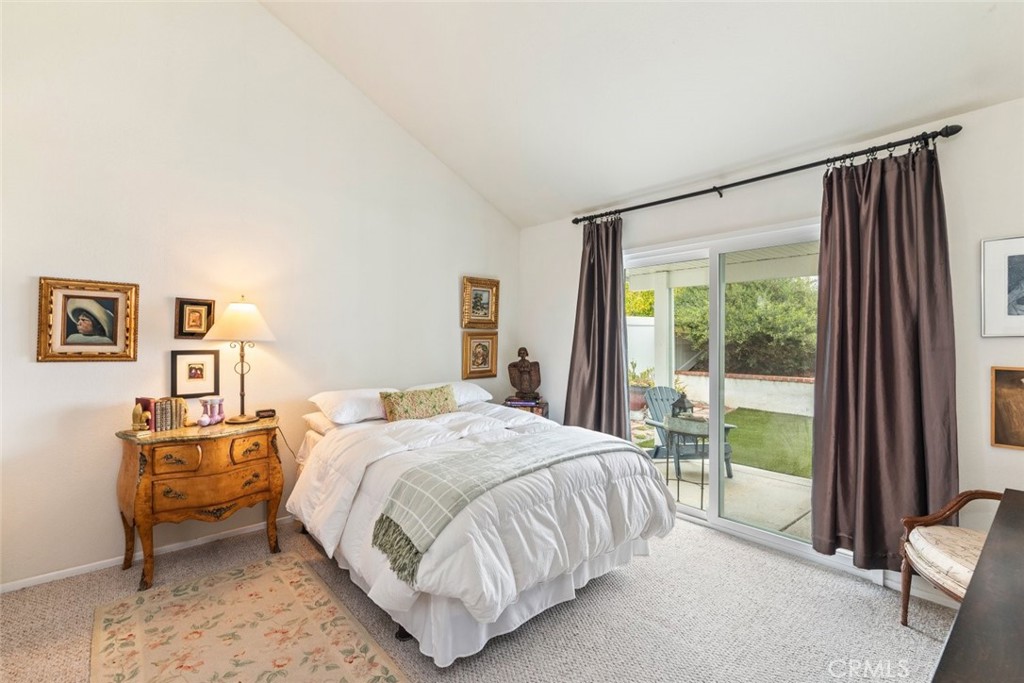 40280 Mimulus Way Temecula, CA 92591 - Photo 17 of 34 a bedroom with a bed and a dresser next to a window