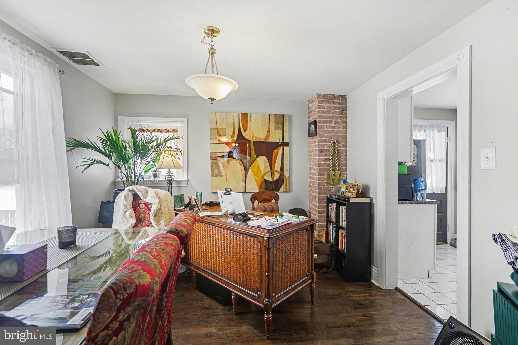 348 East Derry Road Hershey, PA 17033 - Photo 12 of 16 a living room with furniture and wooden floor