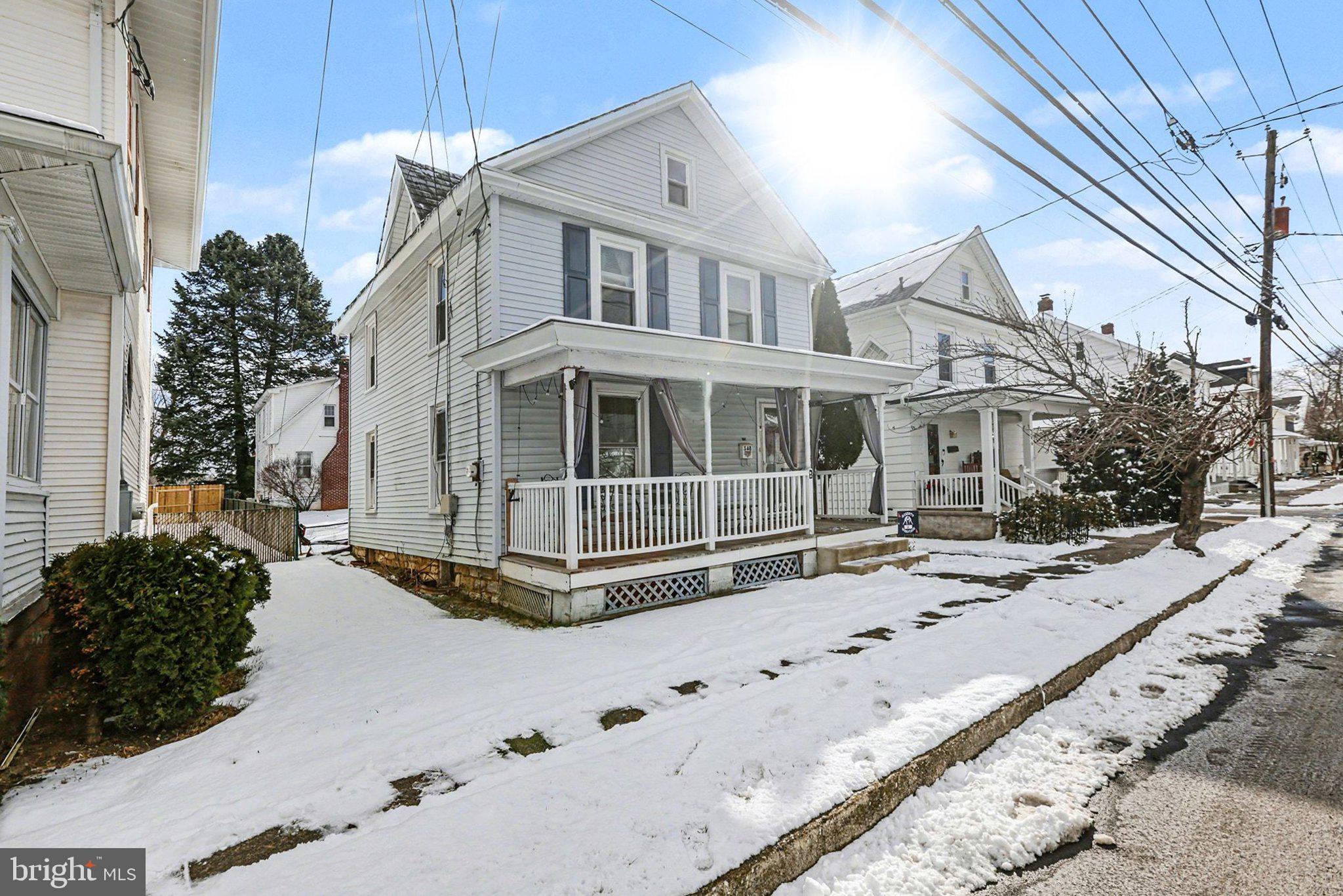348 East Derry Road Hershey, PA 17033 - Photo 15 of 16 a large white building with a large window and yard