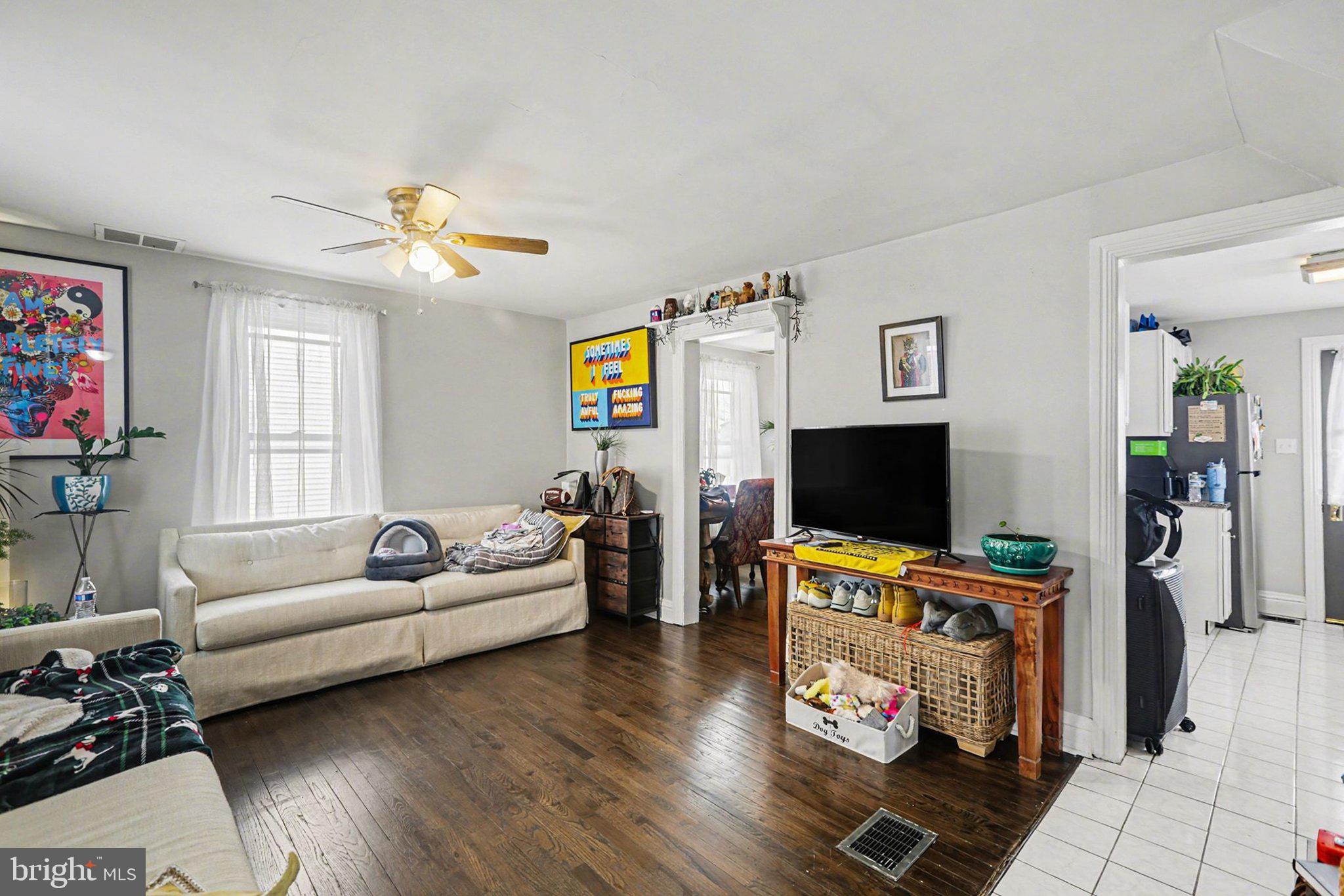 348 East Derry Road Hershey, PA 17033 - Photo 10 of 16 a living room with furniture and a flat screen tv