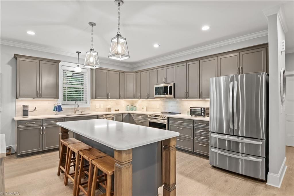 2136 Darrow Road Winston-Salem, NC 27101 - Photo 12 of 50 The kitchen island is functional and attractive!