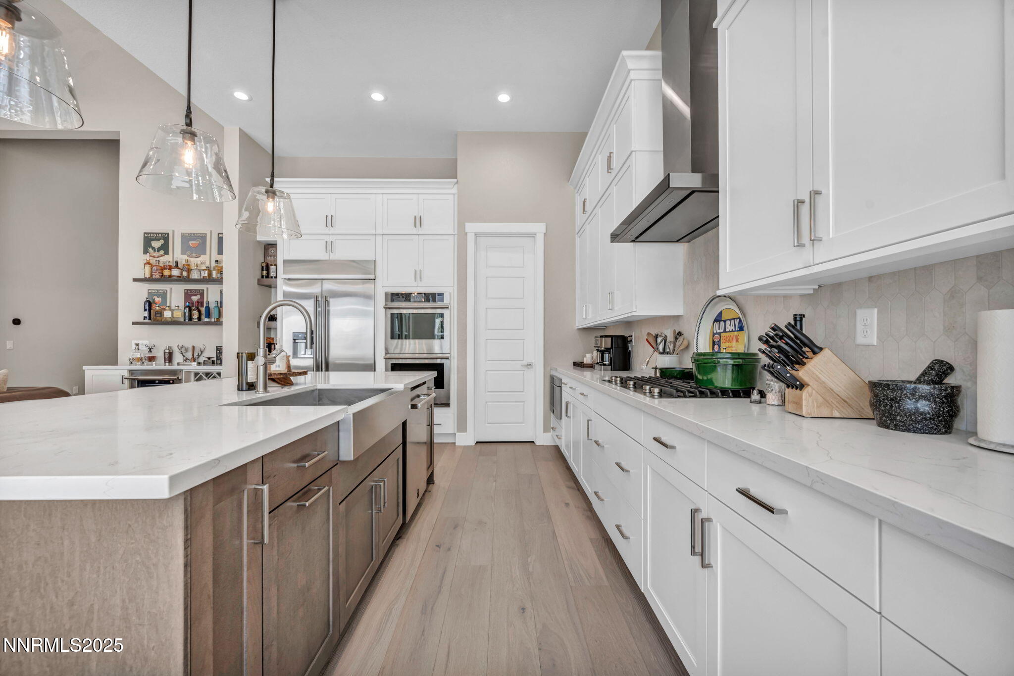 5441 Side Saddle Trail Reno, NV 89511 - Photo 11 of 25 a kitchen with stainless steel appliances granite countertop a sink a stove and cabinets