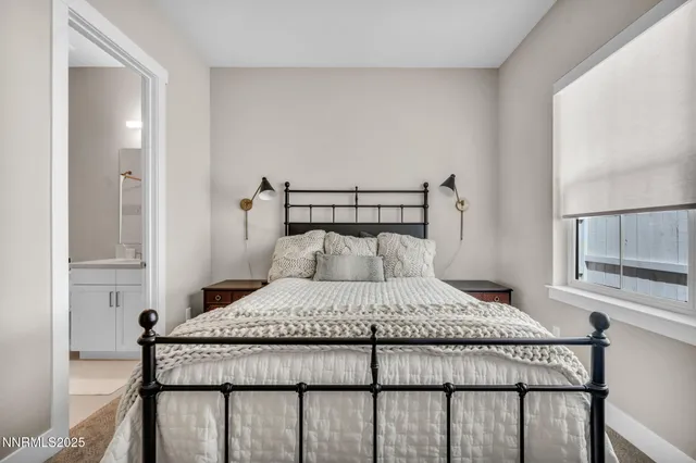 a bed room with a bed and a couch