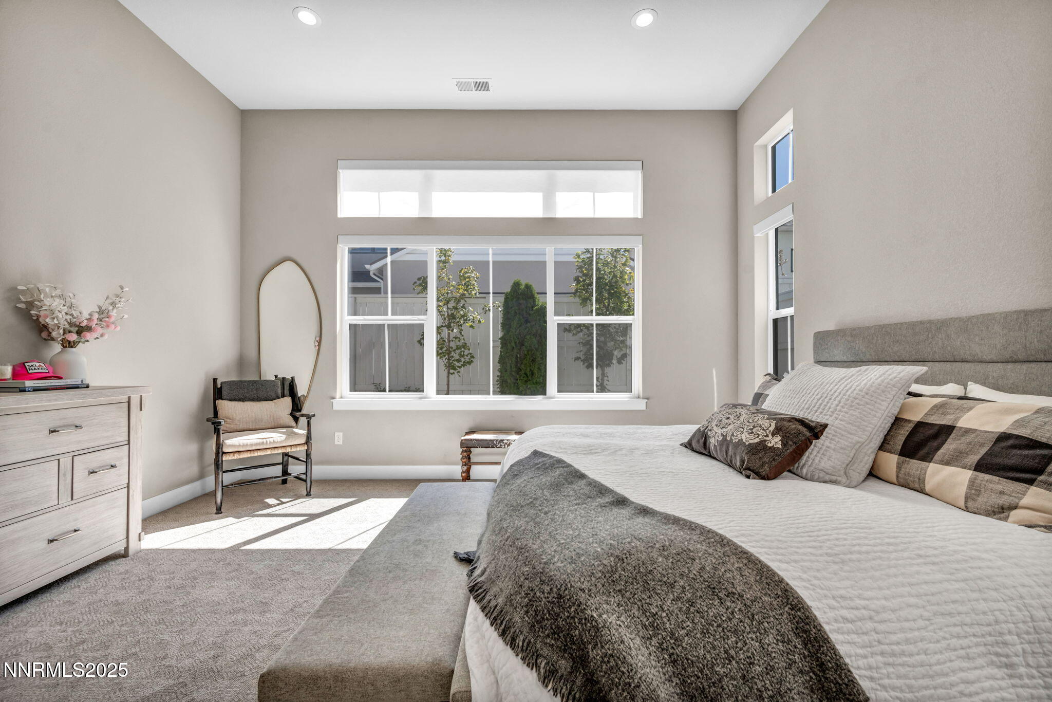 5441 Side Saddle Trail Reno, NV 89511 - Photo 20 of 25 a bedroom with a bed and a large window