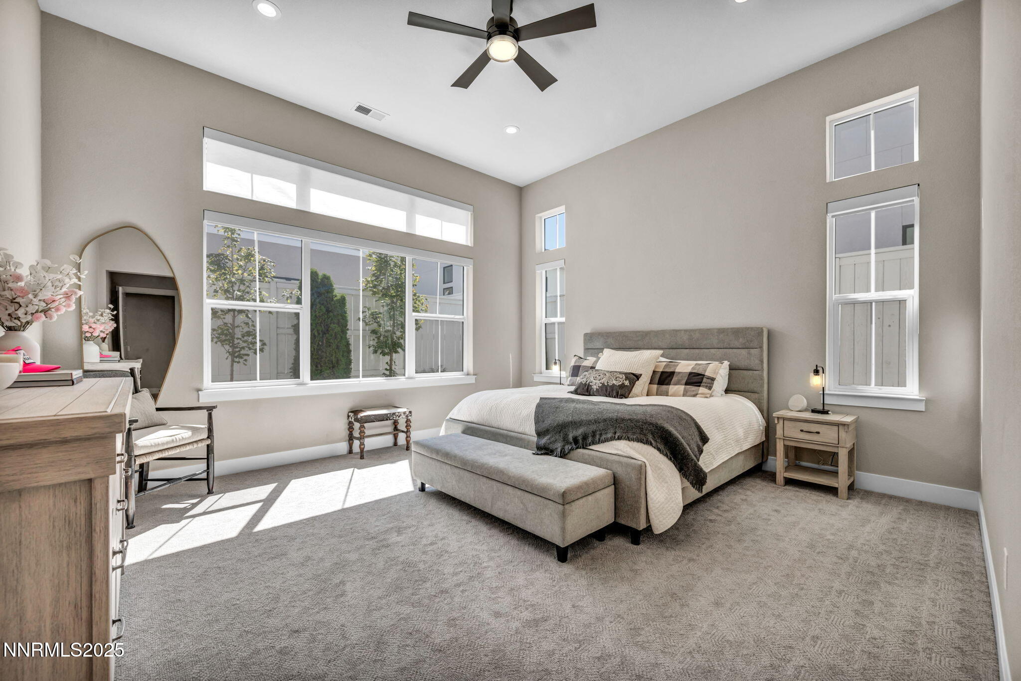 5441 Side Saddle Trail Reno, NV 89511 - Photo 21 of 25 a spacious bedroom with a bed and a large window