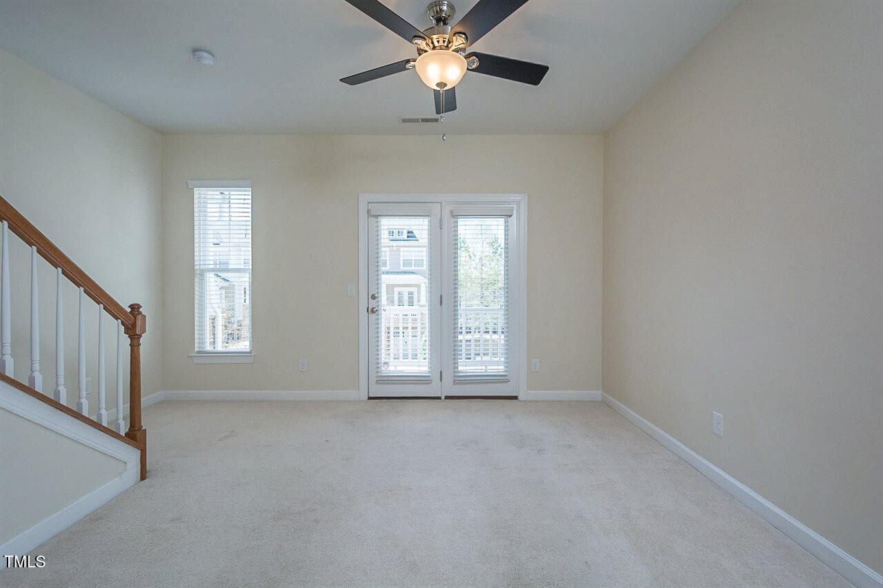 8016 Sycamore Hill Lane Raleigh, NC 27612 - Photo 6 of 19 a view of an empty room with a window