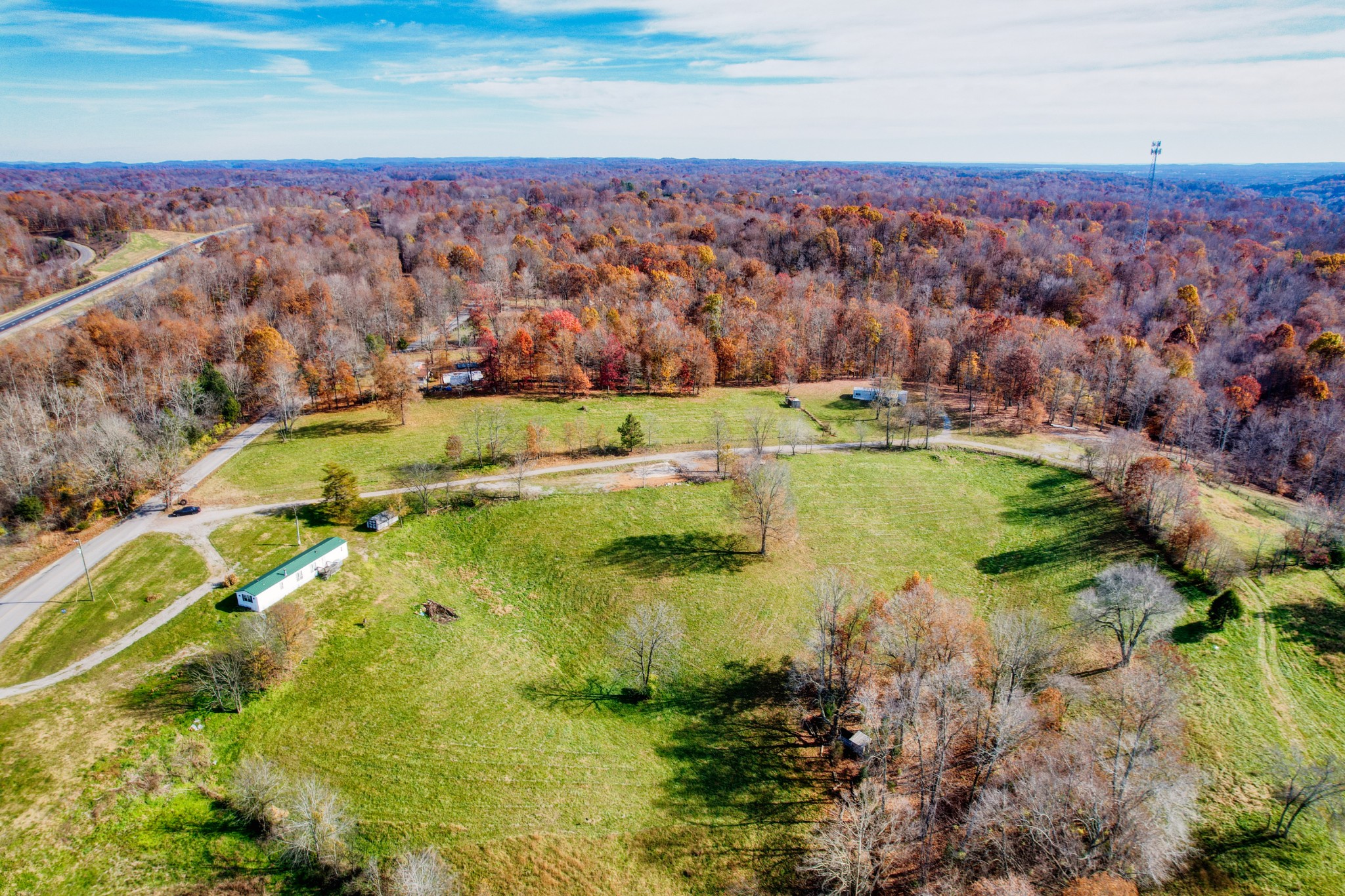3919 Mobley's Cut Road Columbia, TN 38401 - Photo 6 of 17 an aerial view of residential houses with outdoor space