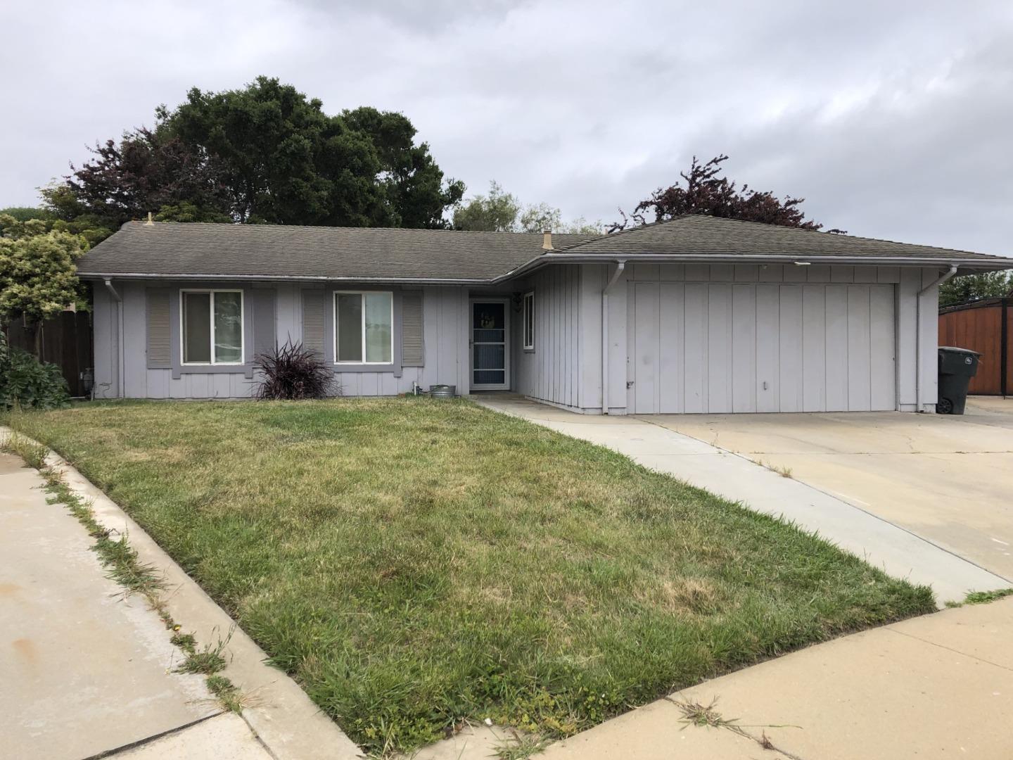 13375 Taft Circle Salinas, CA 93906 - Photo 2 of 18 a front view of a house with a yard
