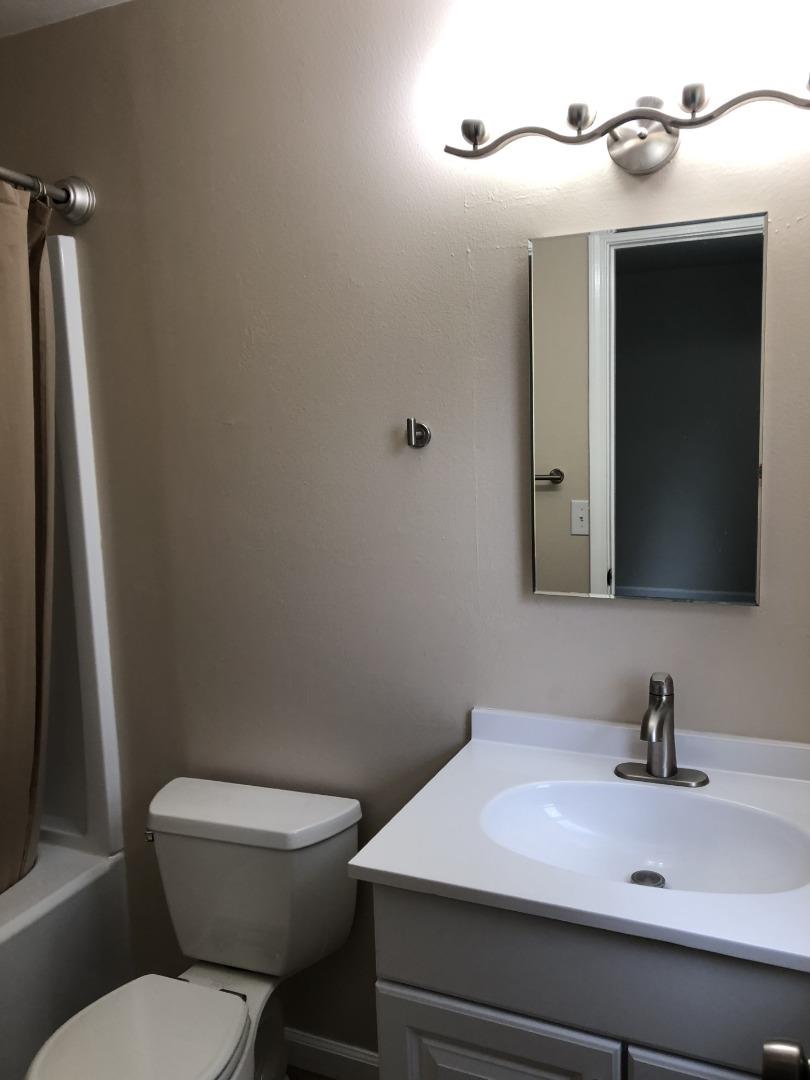 13375 Taft Circle Salinas, CA 93906 - Photo 8 of 18 a bathroom with a sink and a toilet