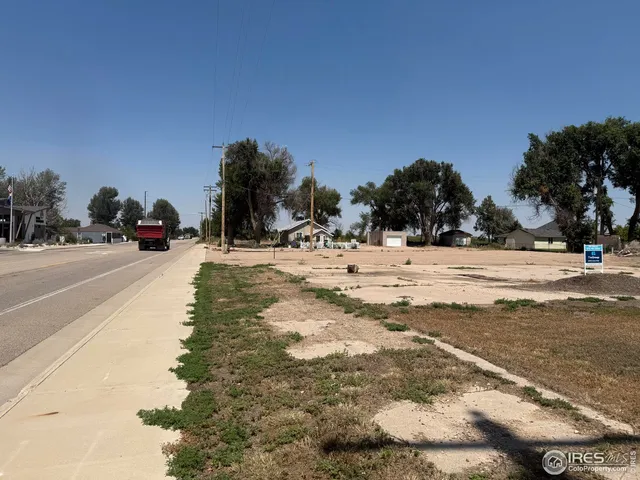 a view of road with trees