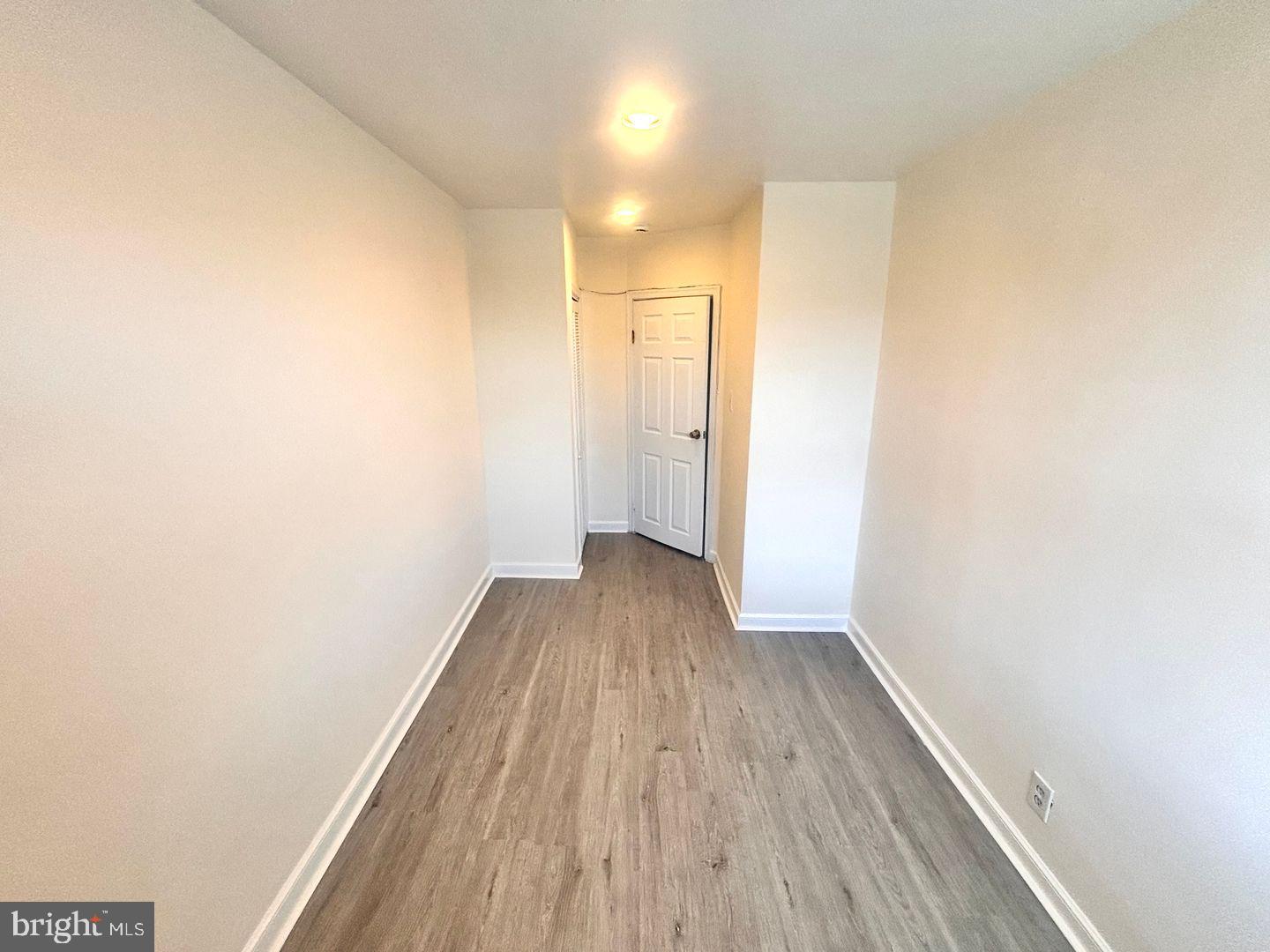 1622 Murdoch Road Philadelphia, PA 19150 - Photo 7 of 12 a view of a hallway with wooden floor