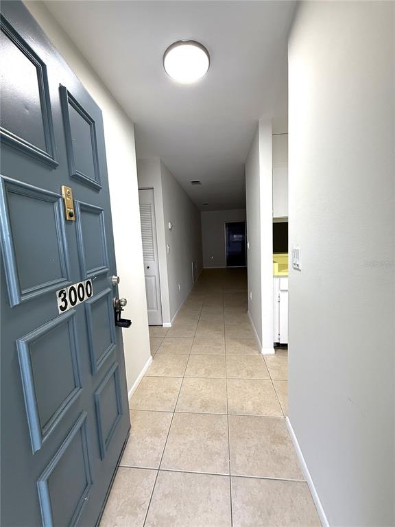 3000 Wainwright Court New Port Richey, FL 34655 - Photo 3 of 17 a view of entryway with kitchen