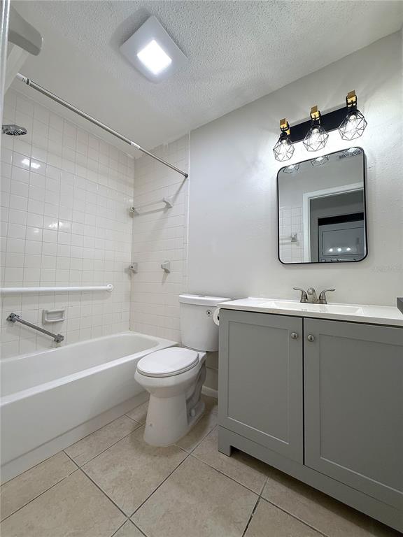 3000 Wainwright Court New Port Richey, FL 34655 - Photo 9 of 17 a bathroom with a sink a toilet and bathtub