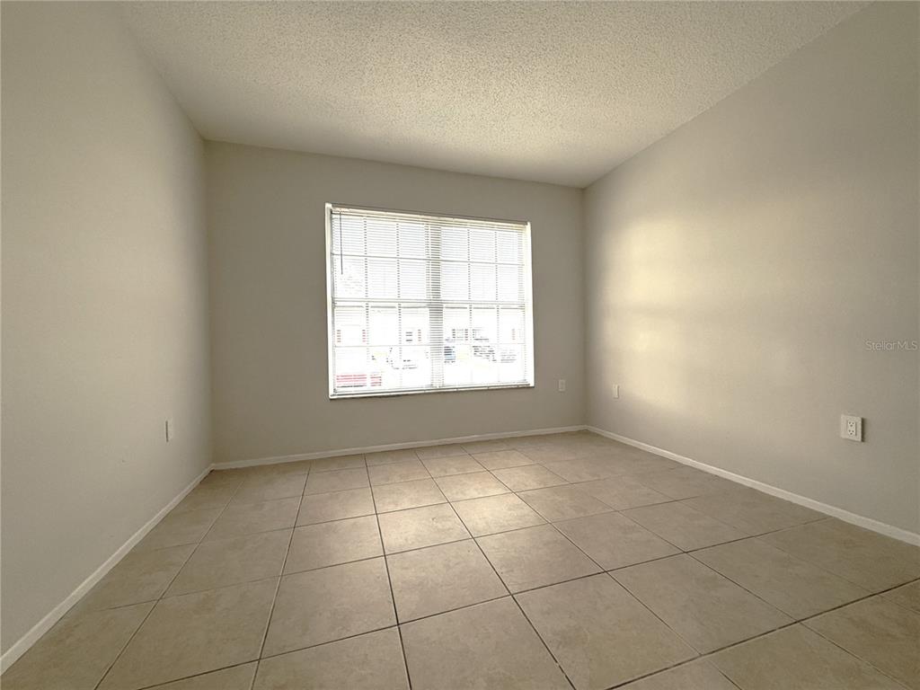 3000 Wainwright Court New Port Richey, FL 34655 - Photo 10 of 17 an empty room with windows