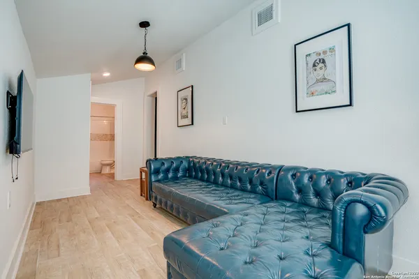 a living room with furniture and a couch