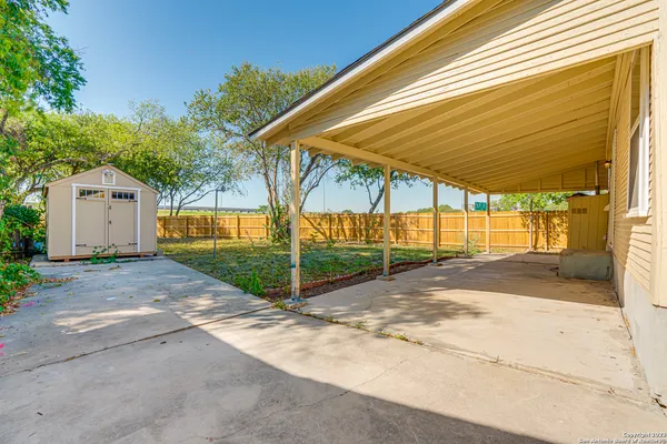 a view of backyard of house