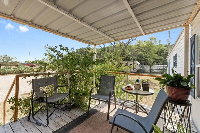 a view of a backyard with plants
