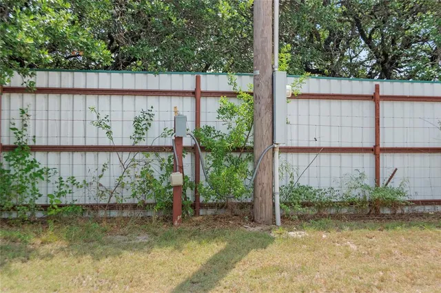 a view of a bathroom with a shower curtain