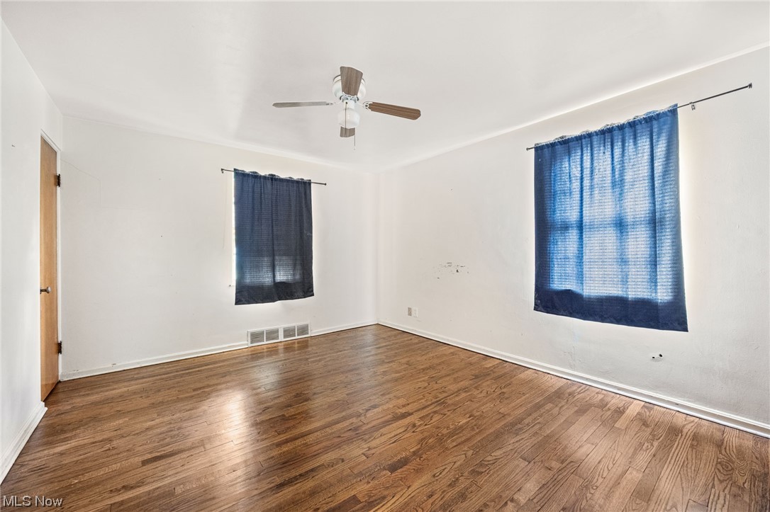 3799 Colony Road South Euclid, OH 44118 - Photo 22 of 34 Unfurnished room with ceiling fan and dark wood-type flooring