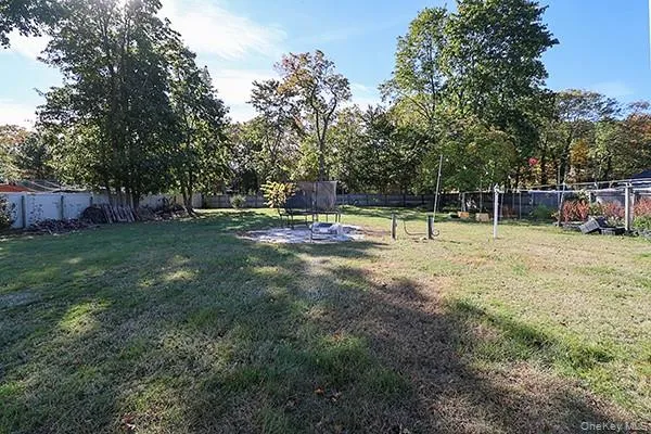 a view of a park with swings and slides