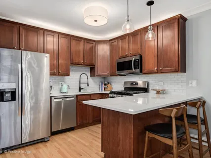 $700,000 | 1945 West Erie Street, Unit 1W, Chicago, IL 60622