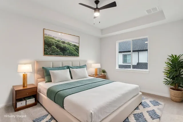 a bedroom with bed and a window