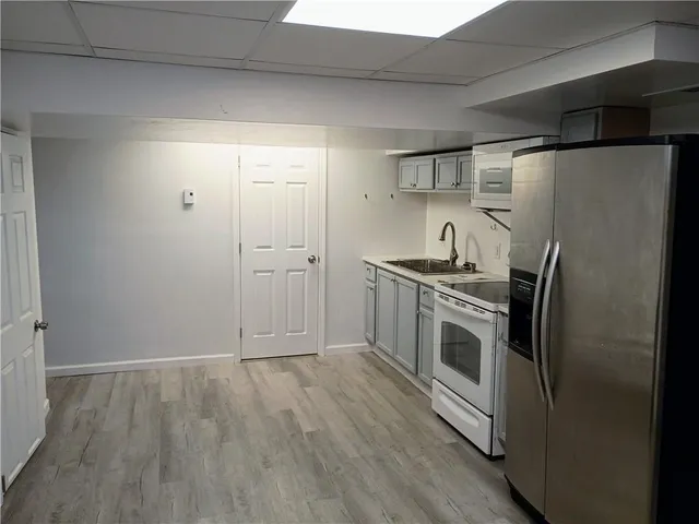 a bathroom with a sink toilet and vanity