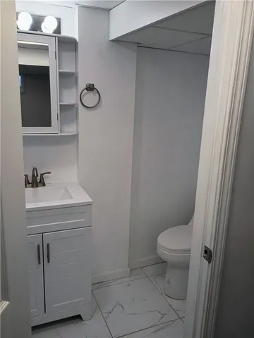 a kitchen with stainless steel appliances a refrigerator stove and sink