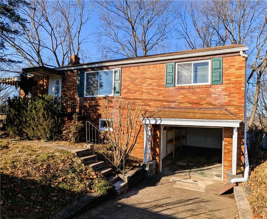 1115 Cascade Drive Homestead, PA 15120 - Photo 3 of 31 a view of house with yard and trees in the background