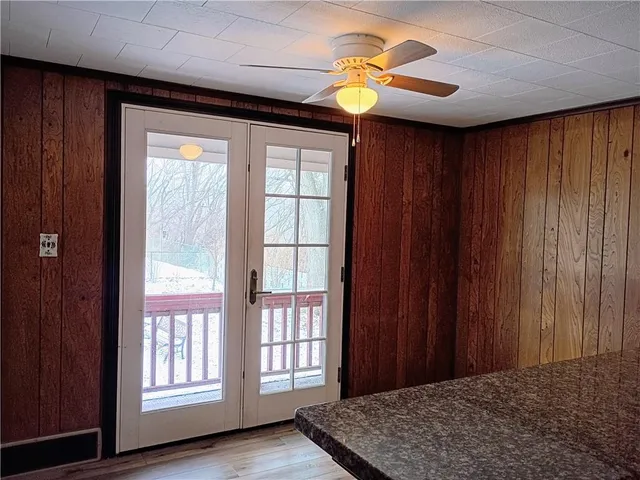 a view of wooden floor in an empty room