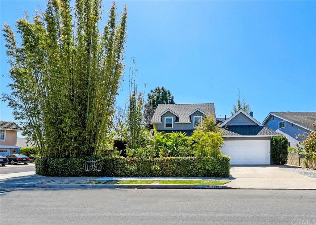 Upon arrival you are greeted by a cluster of tall "Giant Timber Bamboo" trees strategically placed to provide an abundance of privacy, for the interior and exterior, of this beautiful home...Situated on an oversized 6600SF Corner Lot!