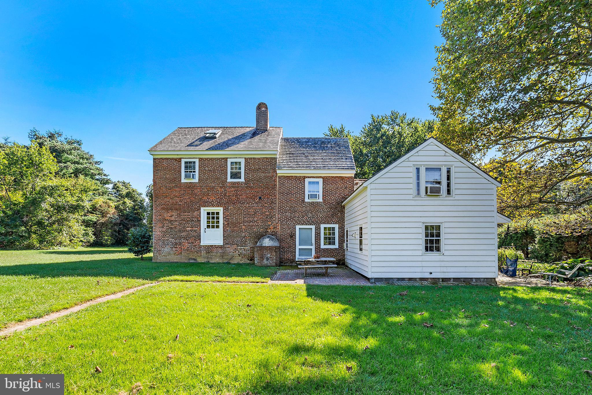 83 Hospital Road Greenwich, NJ 08323 - Photo 5 of 42 a front view of a house with a garden