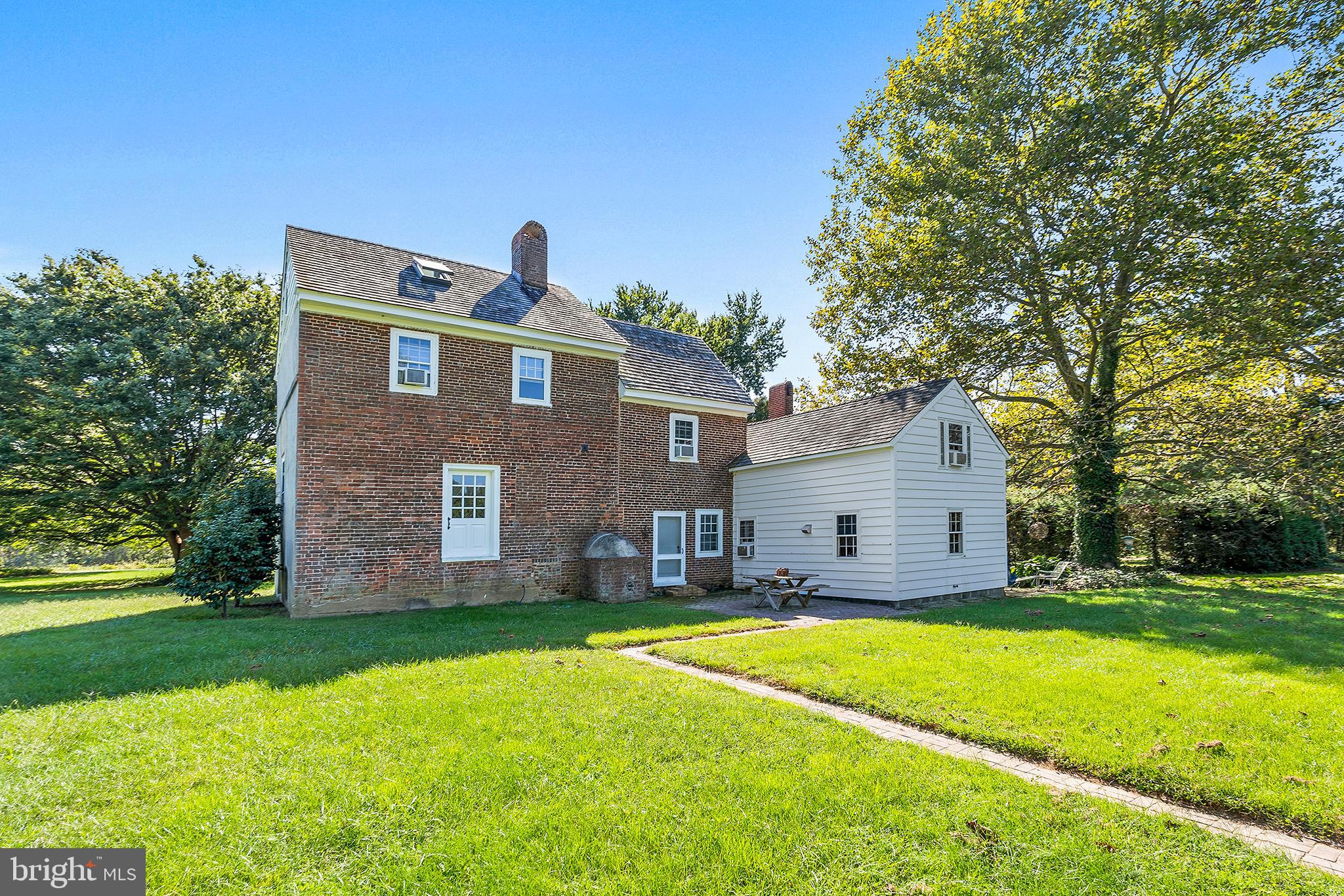 83 Hospital Road Greenwich, NJ 08323 - Photo 6 of 42 a front view of a house with a yard