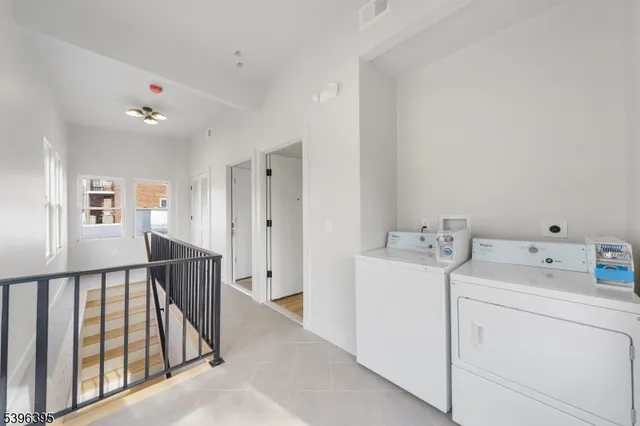 a view of a hallway with workspace